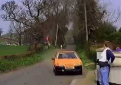 This photographer narrowly avoiding death while photographing a car
