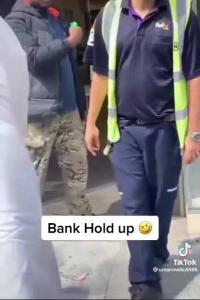 Guy holds up a bank for £1m with a water pistol.