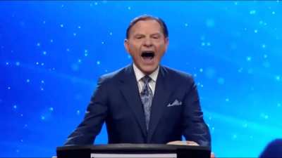 Kenneth Copeland gives a forced laugh at the election results