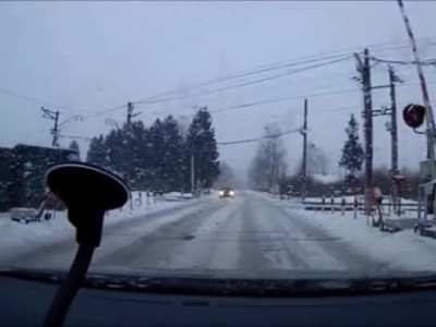 Start driving because the train gate is open