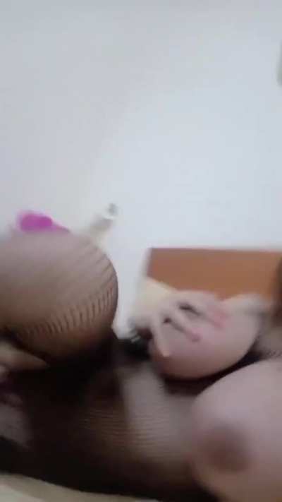 Big tits and cock in fishnets. Donnah Star on her bed (gif)