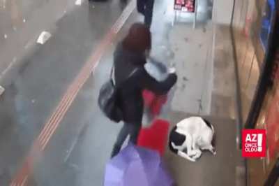 Selfish Woman Steals Scarf from Cold, Homeless, Sleeping Dog.