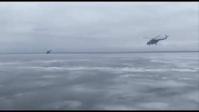 Russian choppers during the first wave of Russian special forces flying over the Dnipro river to Hostomel on February 24, 2022. A video showing the Russian point of view appeared.