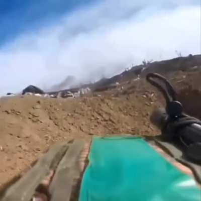 Ukrainian forces storm a trench somewhere in the eastern front, September