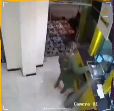 Woman unsatisfied with her bank decides to leave a grenade inside