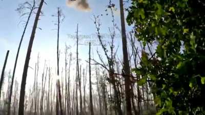 Russian soldier in the Kreminna forest shoots an FPV drone with one shot and then meets up with his squad to get ready to leave