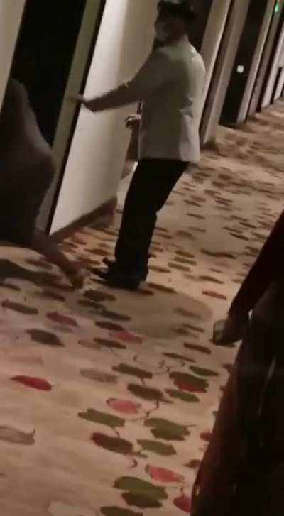 woman gets naked and attacks hotel staff