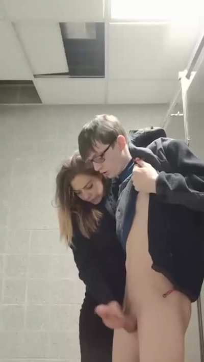 Cheerleader helping out the nerd