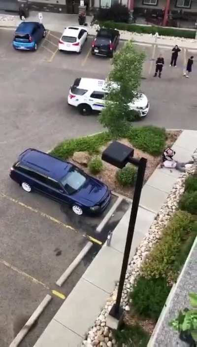 Officer in Alberta, Canada uses excessive force on an old man who isn't resisting. Smacks his head on the ground, then kneels on his head/neck.
