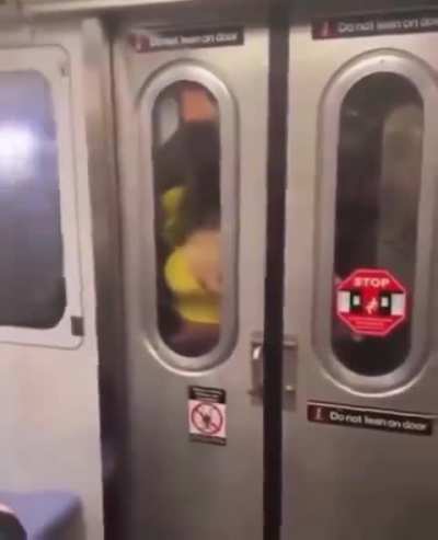 What a loving couple in the subway