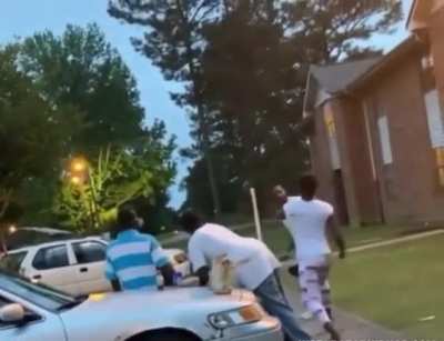 Woman gets smacked with a weedwacker.