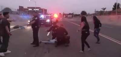 Woman attacks camera man at the scene of the accident…