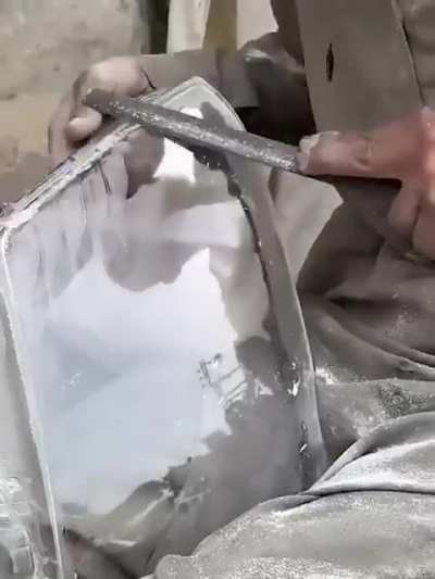 Fabricating a headlight lens cover 
