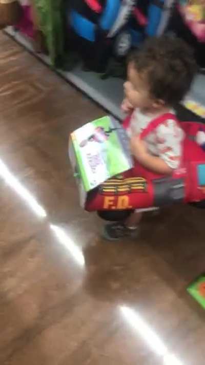 Young firefighter scared by evil clown