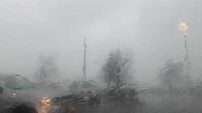 Waiting out the rain in my car this afternoon (Buffalo NY)