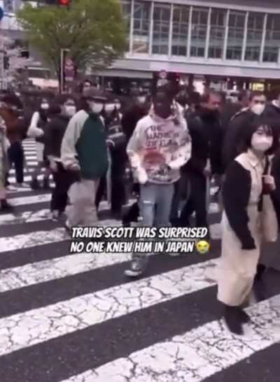 Travis Scott blocking people just going about their day in Japan.