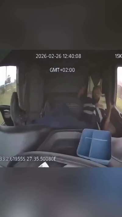Truck driver on the phone again.