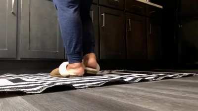 Size 10 black feet doing the dishes