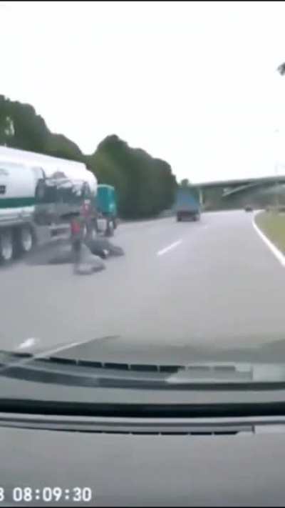 Horrible attempt at securing a tarp to a truck