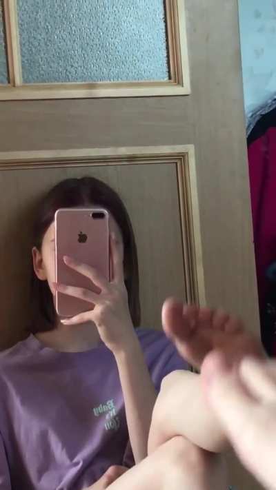 girl removes her sock for you