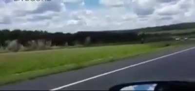 Driving on the opposite side of the road.