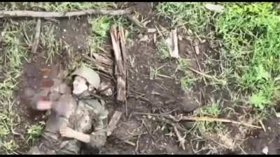 Russian in pain after getting hit by a drone drop. Donetsk region. 