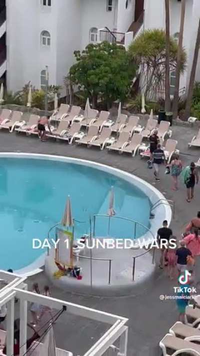 Should’ve just bought a tarp and covered all sunbeds in his eyesight