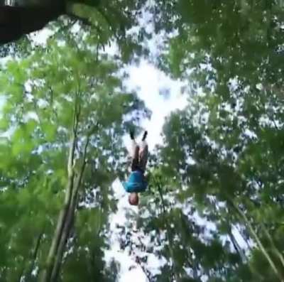 Kid jumping on trampoline