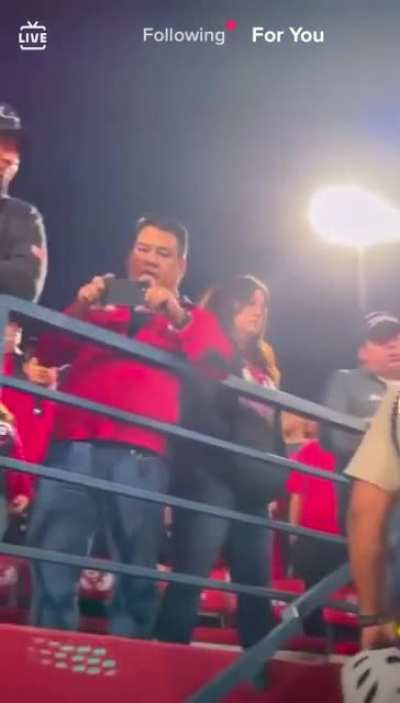 pouring a beer on a dude getting arrested