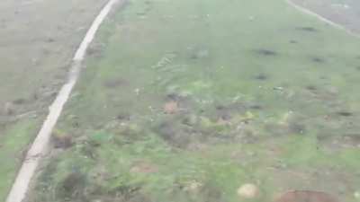 Ukrainian drones and artillery hitting Russian infantry on the outskirts of Bakhmut