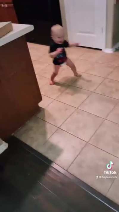 My wife and son playing