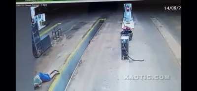 Dude on a motorcycle does a buttery face crayon on smooth concrete.