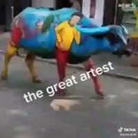 Awesome art! That too on a buffalo!