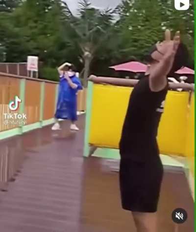 Dude gets nailed by water (not my video)
