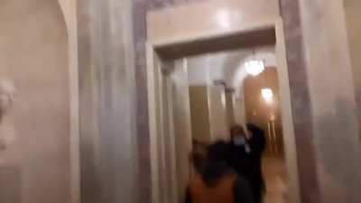 Footage of the first breach of the Capitol has emerged