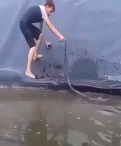A man, a snake and a slide