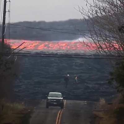 This is not a time-lapse video. Amazing footage of a river of lava moving at an incredible speed captured by photographer Ken Boyer