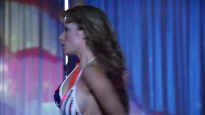 Erica Durance stripping in 