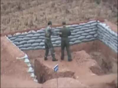 Hand grenade falls back to the pit