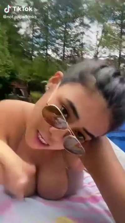 lying down on her soft tits