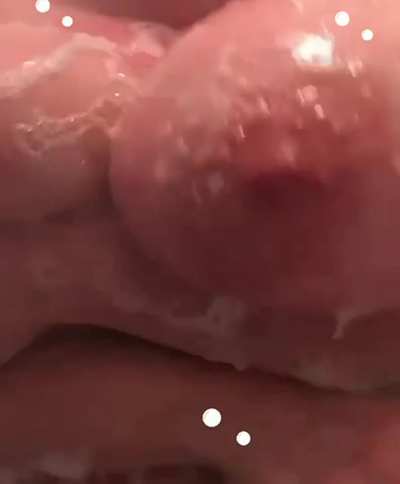 Soapy and bubbly bouncing huge natural titties in the shower!