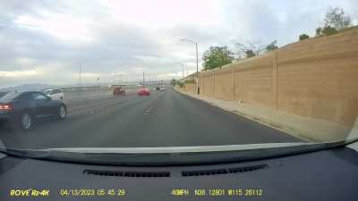 Red truck clips red Camaro