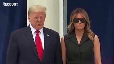 Trump asks Melania to smile during today's photo op.