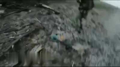 GoPro footage of a Ukrainian soldier attempting to storm a position with his group but then stepping on a mine