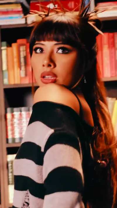 Librarian Girl Xochitl Gomez posing for Hot Topic Social Collision
