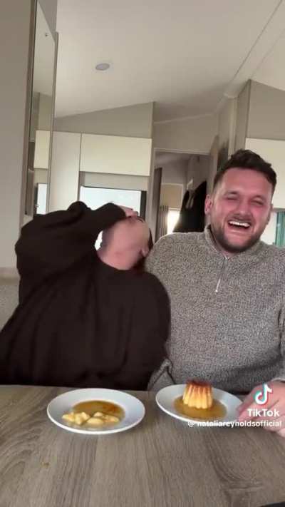 Trying to eat a crème caramel in one gulp