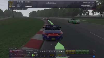 Is this okay from the black car pushing the green car of the track?
