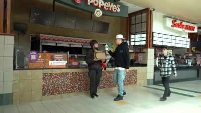 Prankster harasses a random guy in a mall and ends up shot.