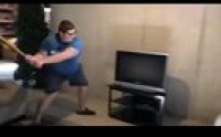 Ungrateful kid smashes tv with a bat