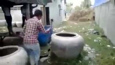 Guy breaks a pot